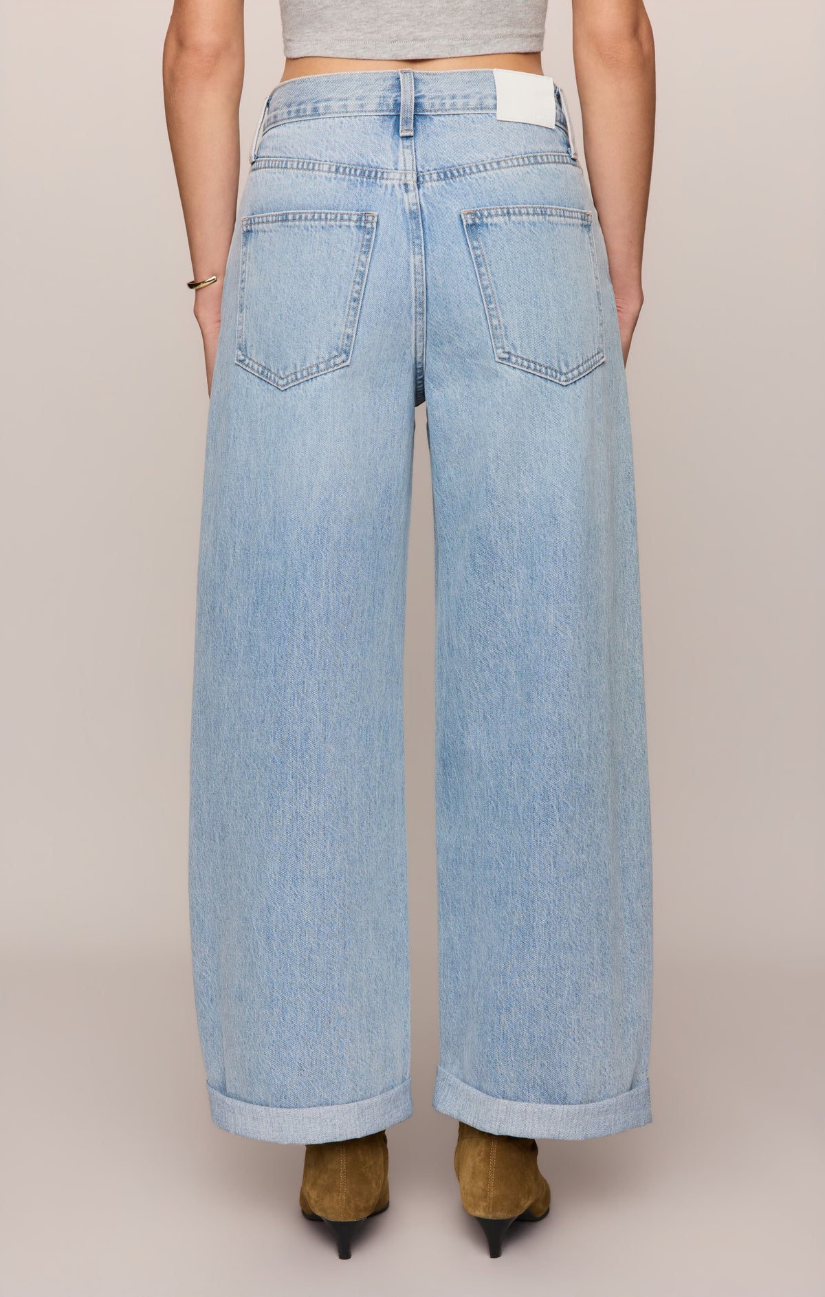 The Show Off High-Rise Bowed Denim